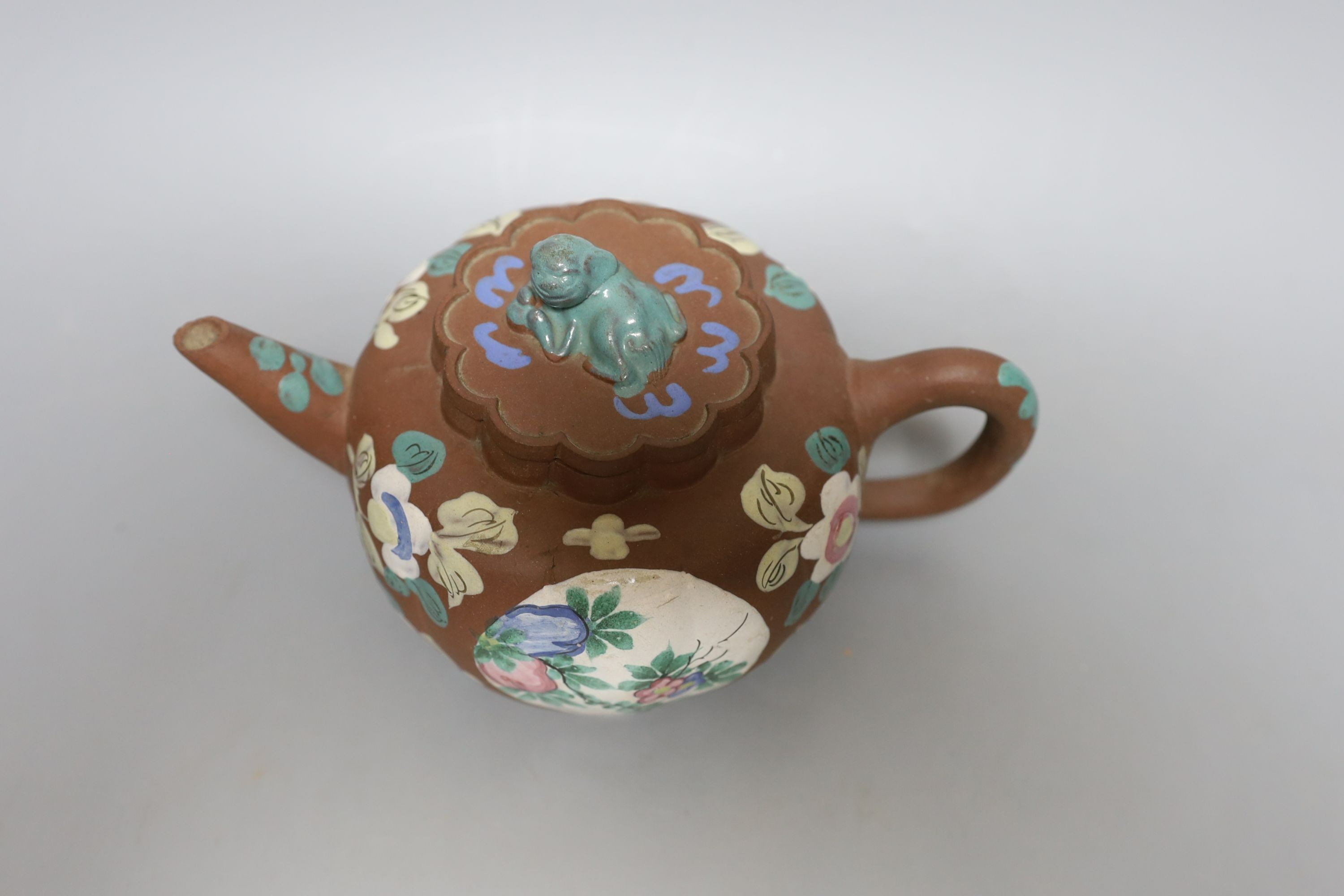 A Chinese Yixing enamelled teapot and cover - 12.5cm tall